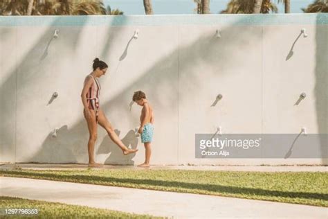 mom and son in the shower